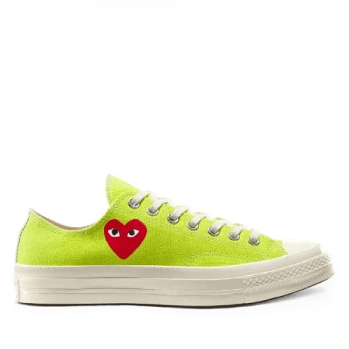 CDG Converse Low Top Lime Green Front CDG Converse Low Top Lime Green front view with heart logo