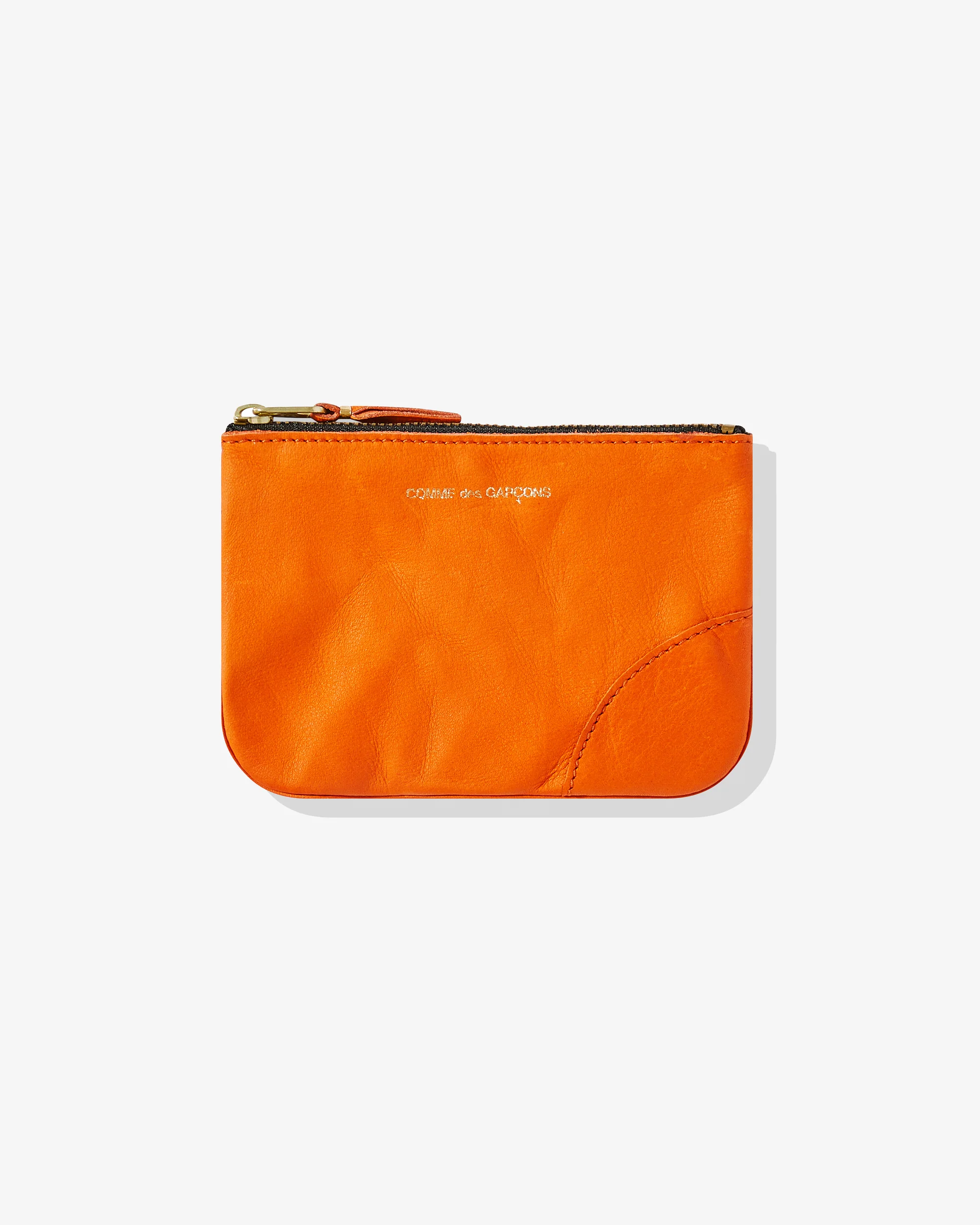 CDG_WALLET_136000013952868_3561_c224a5fa-292f-416c-a194-06122dde6e7f.webp CDG Washed Wallet Zip Pouch Burnt Orange - Image 1