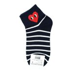 Front view of Comme Des Garcon inspired heart print socks