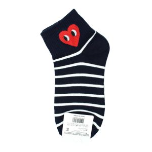 Front view of Comme Des Garcon inspired heart print socks
